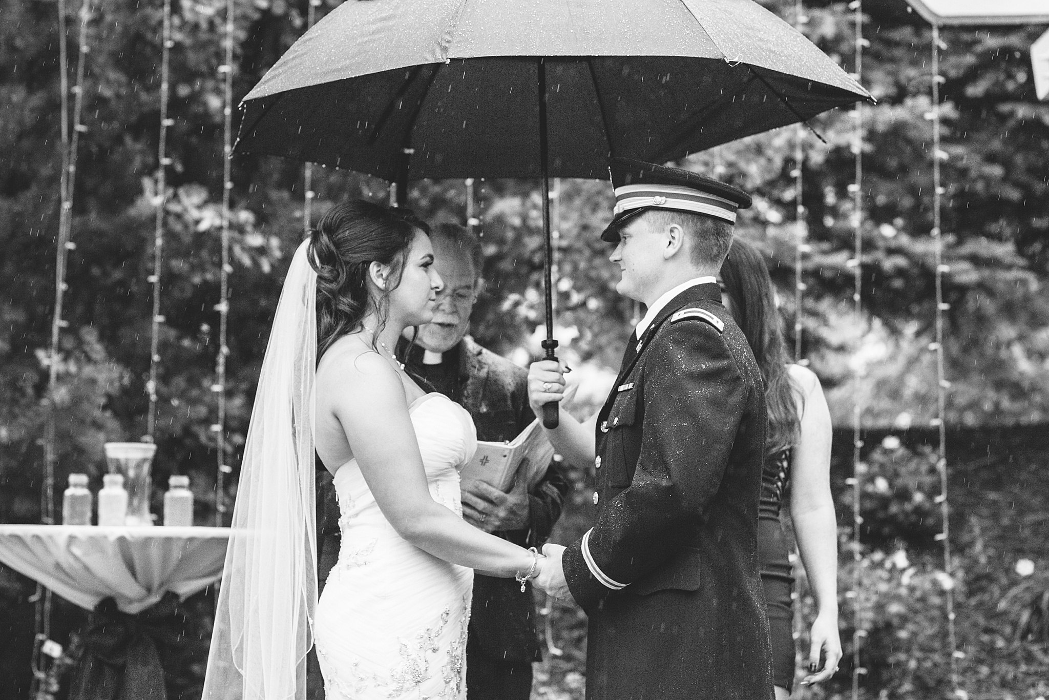 Bride & Groom exchanging vows during a rainy summer wedding. Tania & Chris' Denver Wedding at the Wedgewood Ken Caryl by Colorado Wedding Photography, Jennifer Garza. Colorado Wedding Photographer, Colorado Wedding Photography, Denver Wedding Photographer, Denver Wedding Photography, US Marine Corp Wedding, US Marine Corp, Military Wedding, US Marines, Wedgewood Weddings, Wedgewood Weddings Ken Caryl, Colorado Wedding, Denver Wedding, Wedding Photographer, Colorado Bride, Brides of Colorado