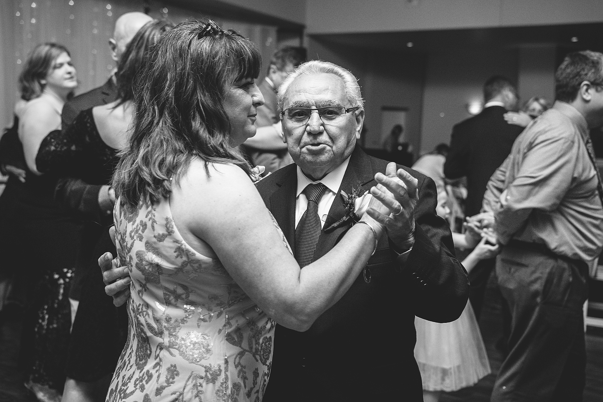 Guests dancing during the wedding reception. Tania & Chris' Denver Wedding at the Wedgewood Ken Caryl by Colorado Wedding Photography, Jennifer Garza. Colorado Wedding Photographer, Colorado Wedding Photography, Denver Wedding Photographer, Denver Wedding Photography, US Marine Corp Wedding, US Marine Corp, Military Wedding, US Marines, Wedgewood Weddings, Wedgewood Weddings Ken Caryl, Colorado Wedding, Denver Wedding, Wedding Photographer, Colorado Bride, Brides of Colorado