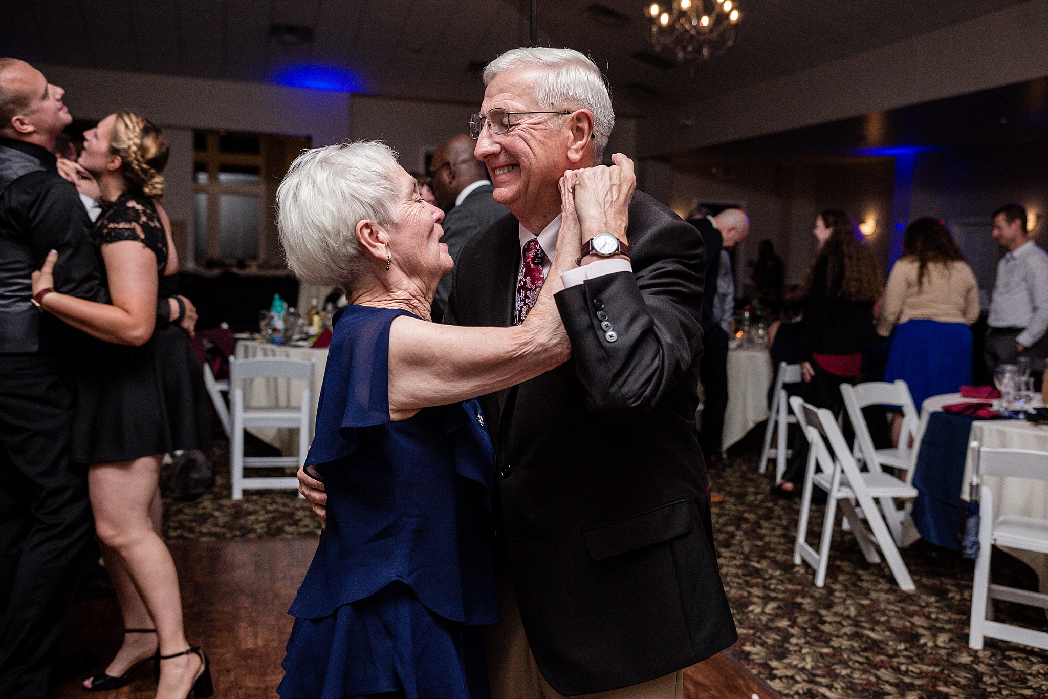 Guests dancing during the wedding reception. Tania & Chris' Denver Wedding at the Wedgewood Ken Caryl by Colorado Wedding Photography, Jennifer Garza. Colorado Wedding Photographer, Colorado Wedding Photography, Denver Wedding Photographer, Denver Wedding Photography, US Marine Corp Wedding, US Marine Corp, Military Wedding, US Marines, Wedgewood Weddings, Wedgewood Weddings Ken Caryl, Colorado Wedding, Denver Wedding, Wedding Photographer, Colorado Bride, Brides of Colorado