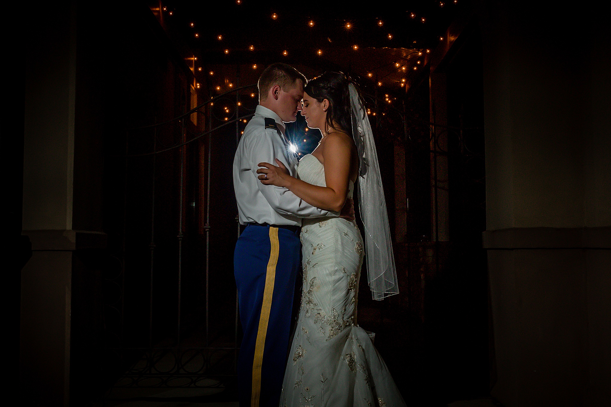 Bride & Groom portrait with string lights in the background. Tania & Chris' Denver Wedding at the Wedgewood Ken Caryl by Colorado Wedding Photography, Jennifer Garza. Colorado Wedding Photographer, Colorado Wedding Photography, Denver Wedding Photographer, Denver Wedding Photography, US Marine Corp Wedding, US Marine Corp, Military Wedding, US Marines, Wedgewood Weddings, Wedgewood Weddings Ken Caryl, Colorado Wedding, Denver Wedding, Wedding Photographer, Colorado Bride, Brides of Colorado