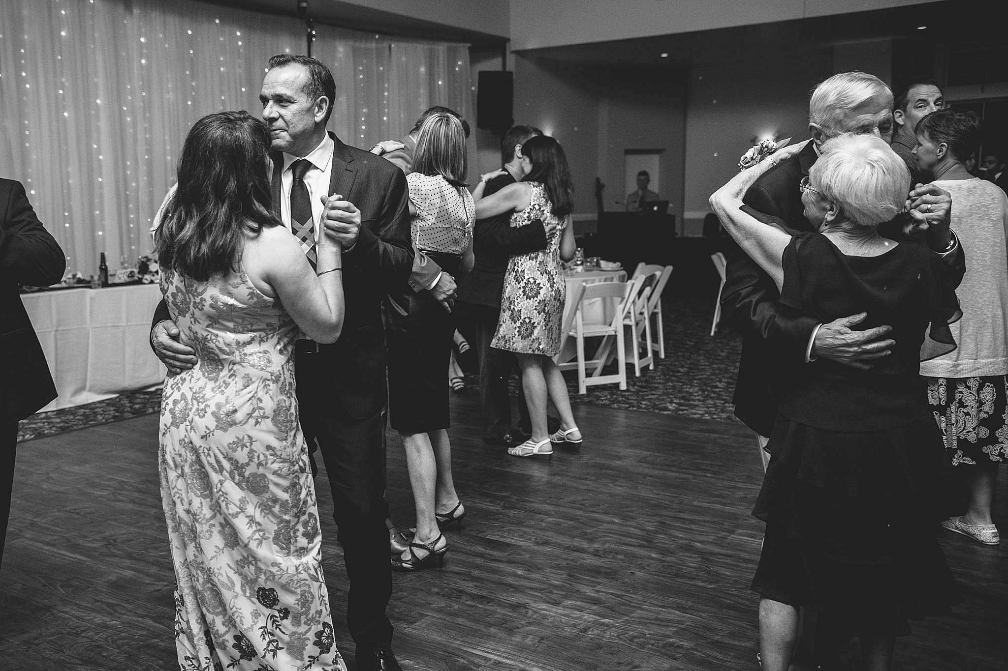 Guests dancing during the wedding reception. Tania & Chris' Denver Wedding at the Wedgewood Ken Caryl by Colorado Wedding Photography, Jennifer Garza. Colorado Wedding Photographer, Colorado Wedding Photography, Denver Wedding Photographer, Denver Wedding Photography, US Marine Corp Wedding, US Marine Corp, Military Wedding, US Marines, Wedgewood Weddings, Wedgewood Weddings Ken Caryl, Colorado Wedding, Denver Wedding, Wedding Photographer, Colorado Bride, Brides of Colorado