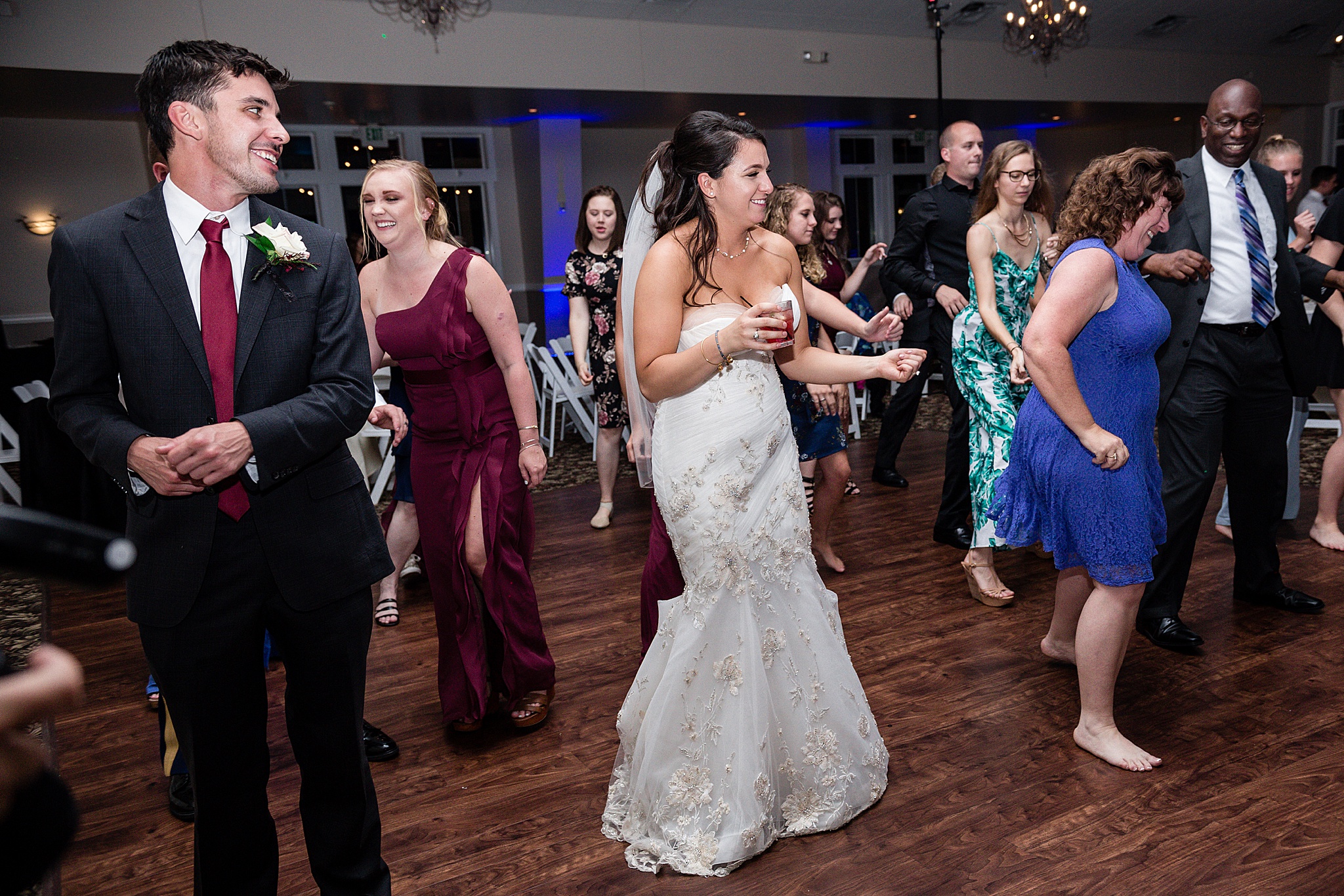 Bride & guests during the wedding reception. Tania & Chris' Denver Wedding at the Wedgewood Ken Caryl by Colorado Wedding Photography, Jennifer Garza. Colorado Wedding Photographer, Colorado Wedding Photography, Denver Wedding Photographer, Denver Wedding Photography, US Marine Corp Wedding, US Marine Corp, Military Wedding, US Marines, Wedgewood Weddings, Wedgewood Weddings Ken Caryl, Colorado Wedding, Denver Wedding, Wedding Photographer, Colorado Bride, Brides of Colorado