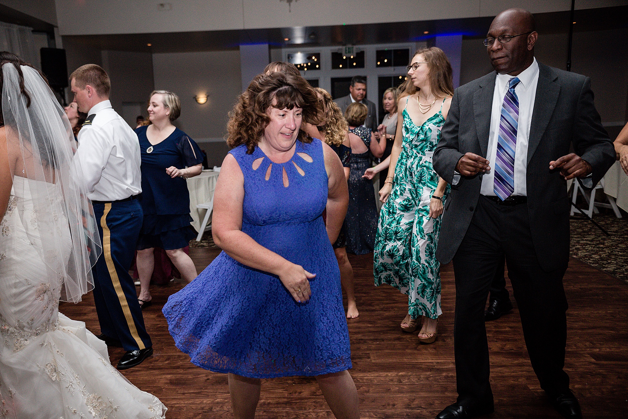 Guests during the wedding reception. Tania & Chris' Denver Wedding at the Wedgewood Ken Caryl by Colorado Wedding Photography, Jennifer Garza. Colorado Wedding Photographer, Colorado Wedding Photography, Denver Wedding Photographer, Denver Wedding Photography, US Marine Corp Wedding, US Marine Corp, Military Wedding, US Marines, Wedgewood Weddings, Wedgewood Weddings Ken Caryl, Colorado Wedding, Denver Wedding, Wedding Photographer, Colorado Bride, Brides of Colorado