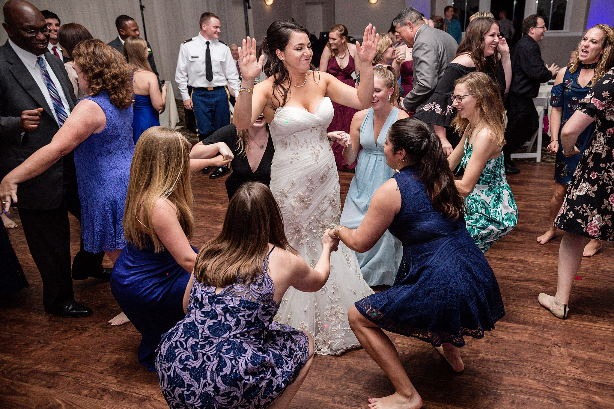 Bride and guests dancing during the wedding reception. Tania & Chris' Denver Wedding at the Wedgewood Ken Caryl by Colorado Wedding Photography, Jennifer Garza. Colorado Wedding Photographer, Colorado Wedding Photography, Denver Wedding Photographer, Denver Wedding Photography, US Marine Corp Wedding, US Marine Corp, Military Wedding, US Marines, Wedgewood Weddings, Wedgewood Weddings Ken Caryl, Colorado Wedding, Denver Wedding, Wedding Photographer, Colorado Bride, Brides of Colorado