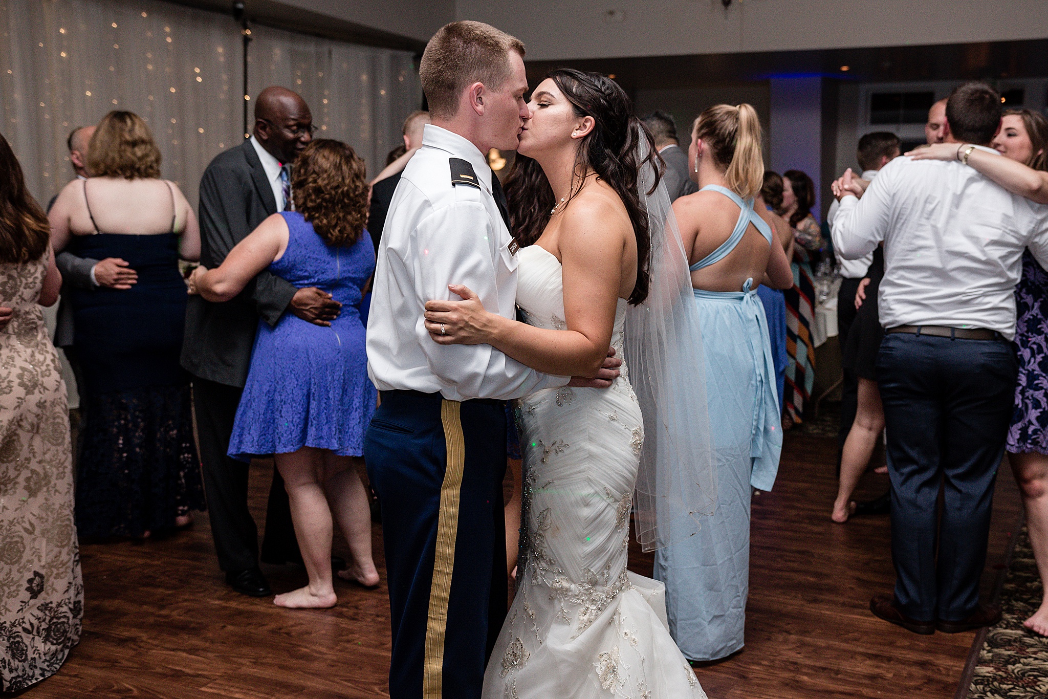 Bride & Groom kissing on the dance floor. Tania & Chris' Denver Wedding at the Wedgewood Ken Caryl by Colorado Wedding Photography, Jennifer Garza. Colorado Wedding Photographer, Colorado Wedding Photography, Denver Wedding Photographer, Denver Wedding Photography, US Marine Corp Wedding, US Marine Corp, Military Wedding, US Marines, Wedgewood Weddings, Wedgewood Weddings Ken Caryl, Colorado Wedding, Denver Wedding, Wedding Photographer, Colorado Bride, Brides of Colorado