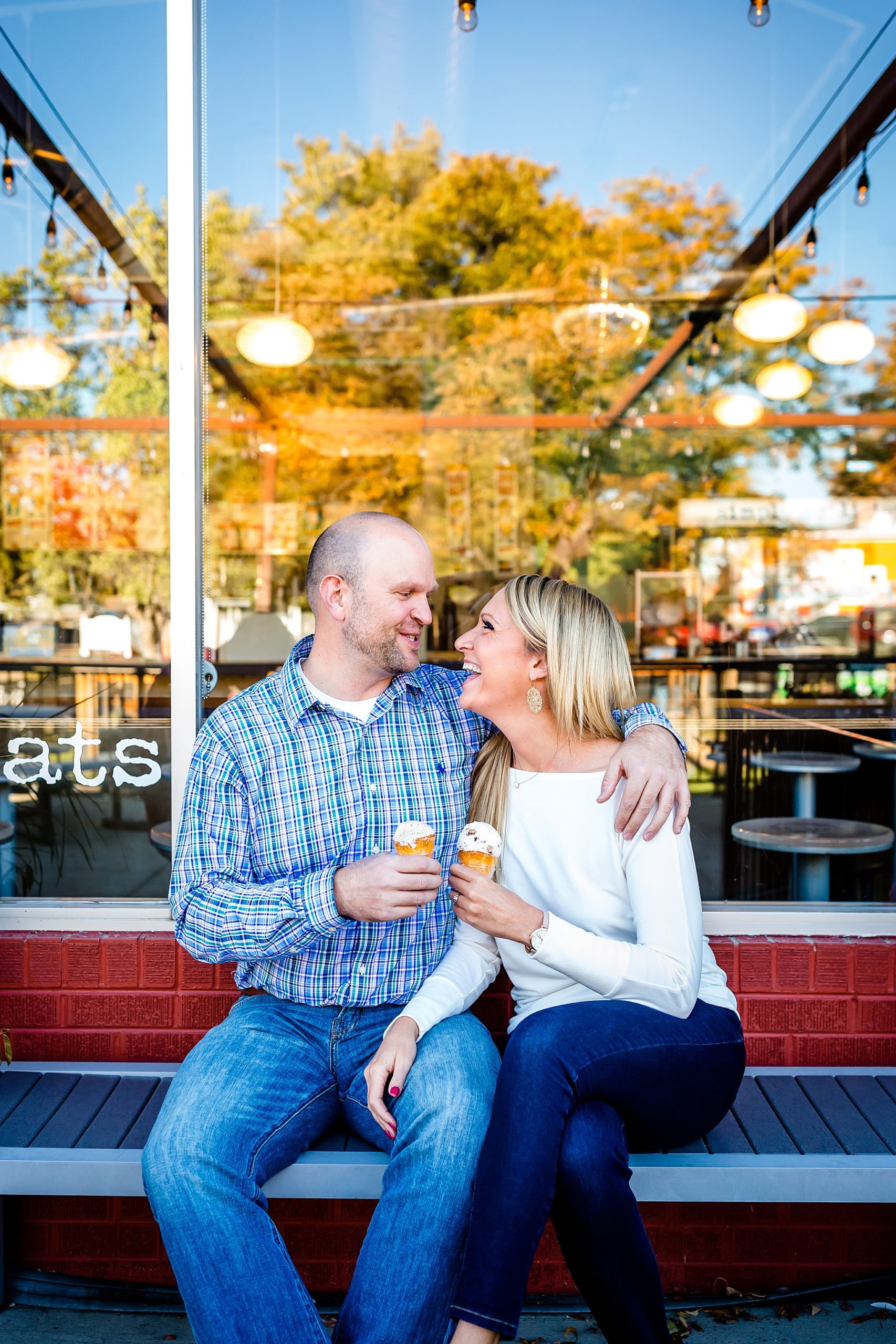 Couple eating ice cream at Sweet Cow during their Colorado engagement session. Kelli & Jason’s Sweet Cow Ice Cream and Davidson Mesa Fall Engagement Session by Colorado Engagement Photographer, Jennifer Garza. Colorado Engagement Photographer, Colorado Engagement Photography, Sweet Cow Engagement Session, Davidson Mesa Engagement Session, Colorado Fall Engagement Photos, Fall Engagement Photography, Mountain Engagement Photographer, Colorado Wedding, Colorado Bride, MagMod