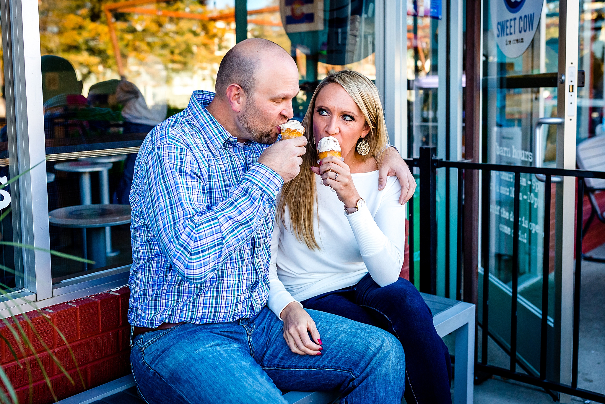 Couple eating ice cream at Sweet Cow during their Colorado engagement session. Kelli & Jason’s Sweet Cow Ice Cream and Davidson Mesa Fall Engagement Session by Colorado Engagement Photographer, Jennifer Garza. Colorado Engagement Photographer, Colorado Engagement Photography, Sweet Cow Engagement Session, Davidson Mesa Engagement Session, Colorado Fall Engagement Photos, Fall Engagement Photography, Mountain Engagement Photographer, Colorado Wedding, Colorado Bride, MagMod