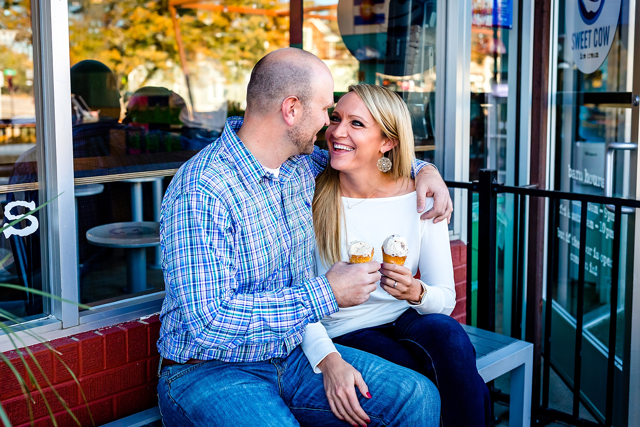 Couple eating ice cream at Sweet Cow during their Colorado engagement session. Kelli & Jason’s Sweet Cow Ice Cream and Davidson Mesa Fall Engagement Session by Colorado Engagement Photographer, Jennifer Garza. Colorado Engagement Photographer, Colorado Engagement Photography, Sweet Cow Engagement Session, Davidson Mesa Engagement Session, Colorado Fall Engagement Photos, Fall Engagement Photography, Mountain Engagement Photographer, Colorado Wedding, Colorado Bride, MagMod