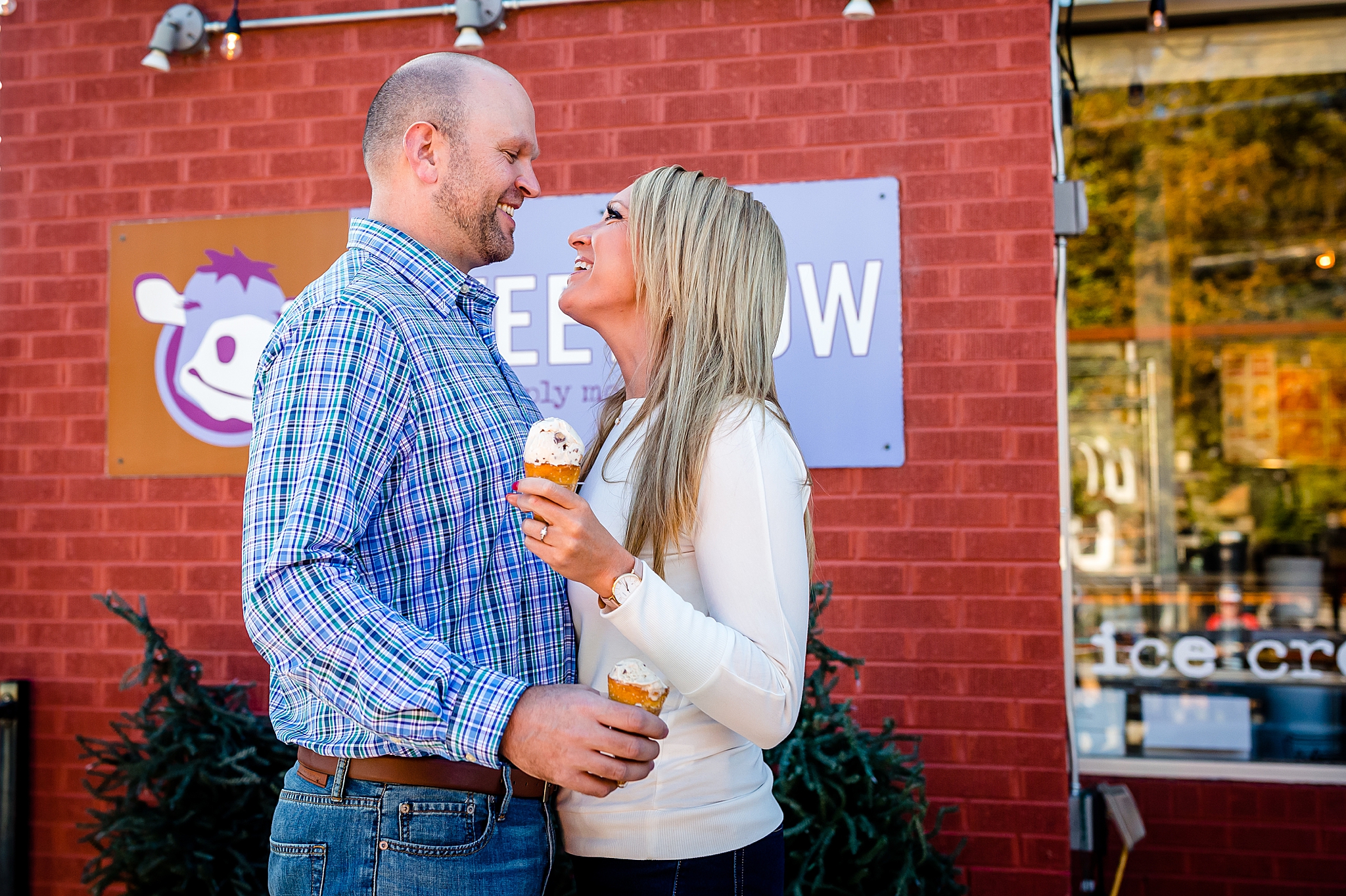 Couple eating ice cream at Sweet Cow during their Colorado engagement session. Kelli & Jason’s Sweet Cow Ice Cream and Davidson Mesa Fall Engagement Session by Colorado Engagement Photographer, Jennifer Garza. Colorado Engagement Photographer, Colorado Engagement Photography, Sweet Cow Engagement Session, Davidson Mesa Engagement Session, Colorado Fall Engagement Photos, Fall Engagement Photography, Mountain Engagement Photographer, Colorado Wedding, Colorado Bride, MagMod