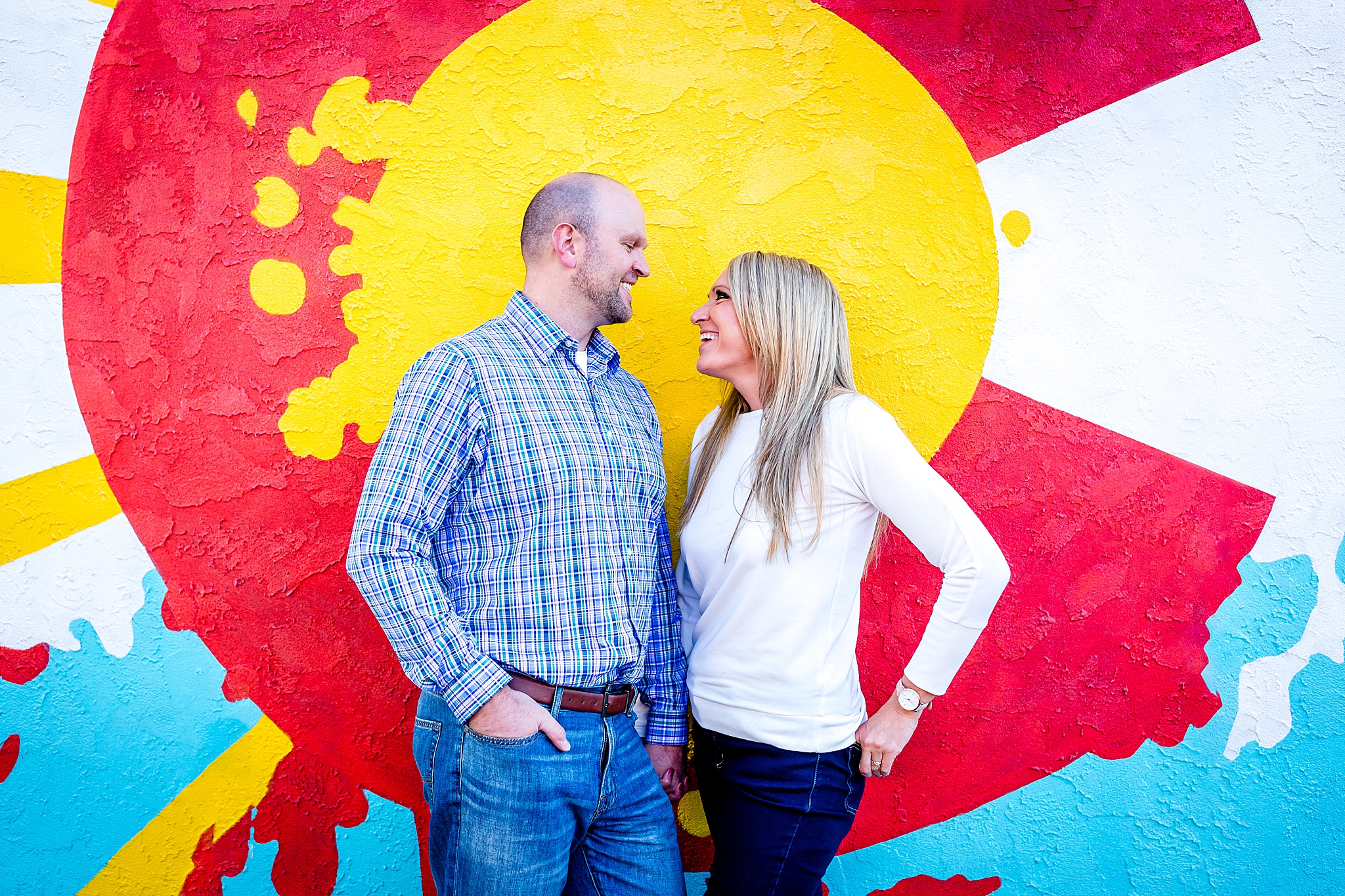 Engaged couple in front of a Colorado graffiti mural during their Colorado engagement session. Kelli & Jason’s Sweet Cow Ice Cream and Davidson Mesa Fall Engagement Session by Colorado Engagement Photographer, Jennifer Garza. Colorado Engagement Photographer, Colorado Engagement Photography, Sweet Cow Engagement Session, Davidson Mesa Engagement Session, Colorado Fall Engagement Photos, Fall Engagement Photography, Mountain Engagement Photographer, Colorado Wedding, Colorado Bride, MagMod