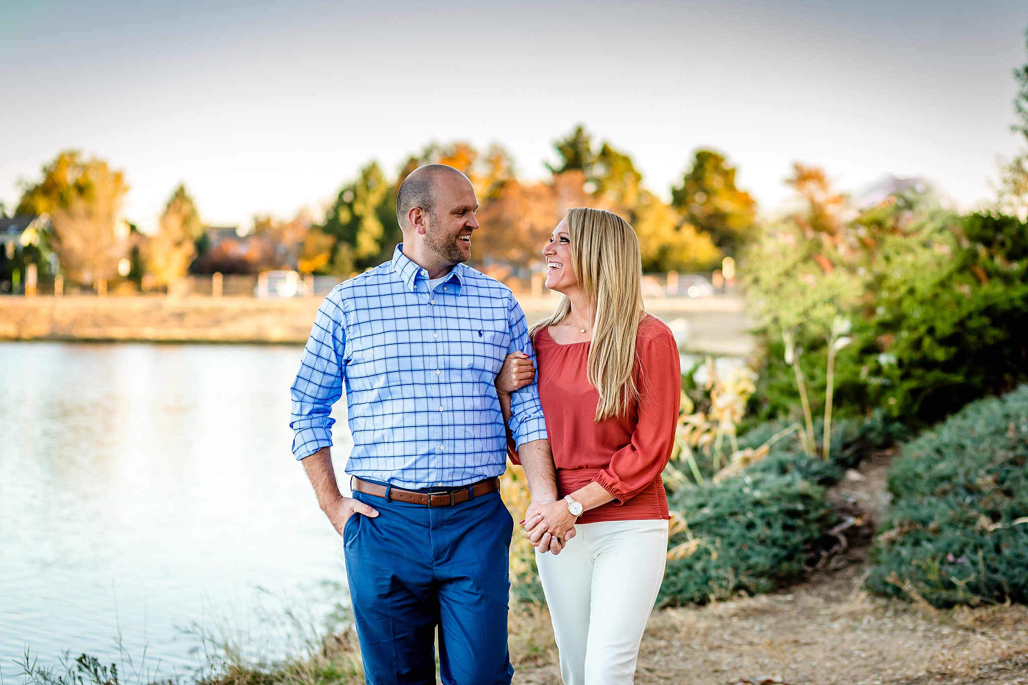 Engaged couple walking along a lake during their Colorado engagement session. Kelli & Jason’s Sweet Cow Ice Cream and Davidson Mesa Fall Engagement Session by Colorado Engagement Photographer, Jennifer Garza. Colorado Engagement Photographer, Colorado Engagement Photography, Sweet Cow Engagement Session, Davidson Mesa Engagement Session, Colorado Fall Engagement Photos, Fall Engagement Photography, Mountain Engagement Photographer, Colorado Wedding, Colorado Bride, MagMod