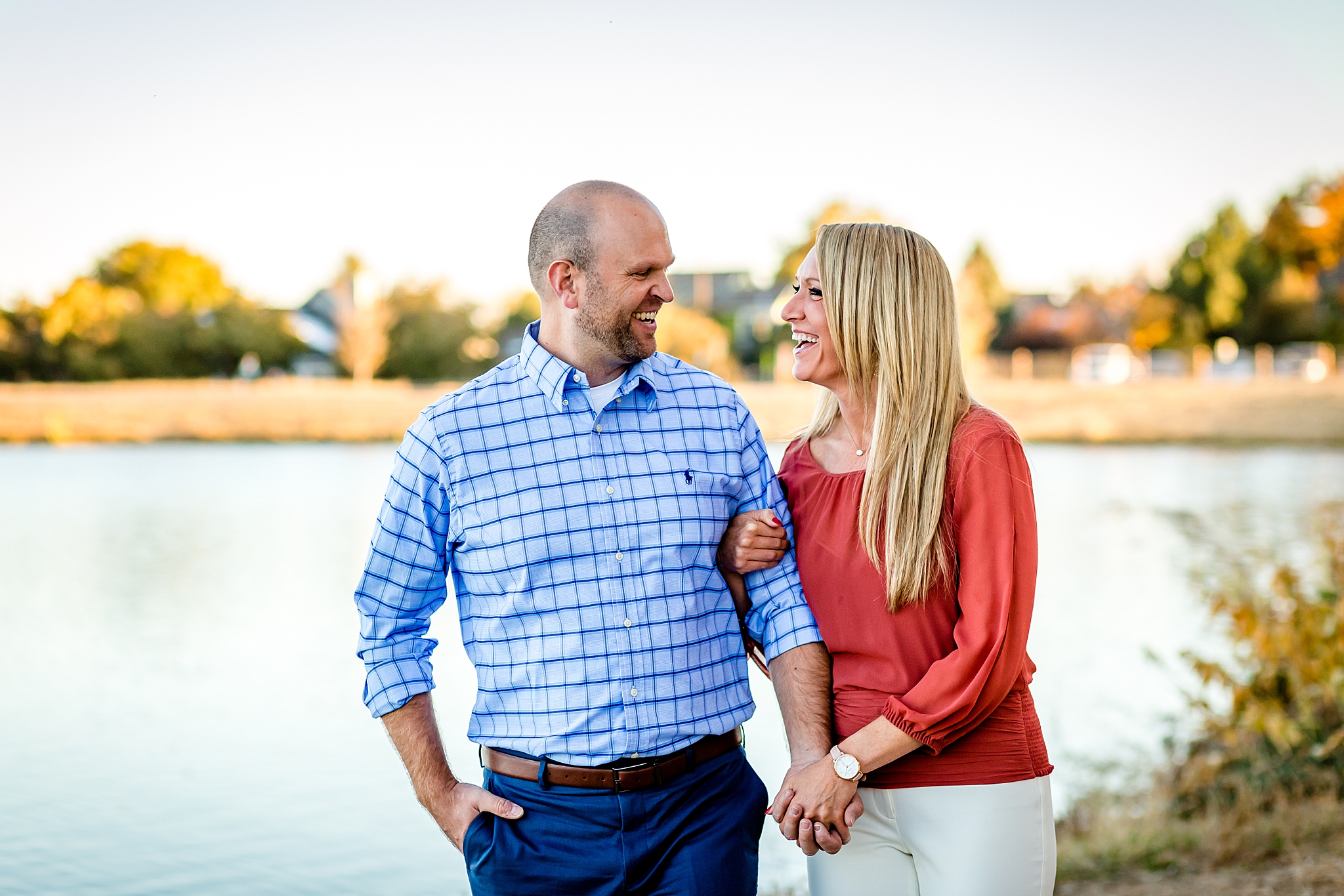 Engaged couple walking along a lake during their Colorado engagement session. Kelli & Jason’s Sweet Cow Ice Cream and Davidson Mesa Fall Engagement Session by Colorado Engagement Photographer, Jennifer Garza. Colorado Engagement Photographer, Colorado Engagement Photography, Sweet Cow Engagement Session, Davidson Mesa Engagement Session, Colorado Fall Engagement Photos, Fall Engagement Photography, Mountain Engagement Photographer, Colorado Wedding, Colorado Bride, MagMod