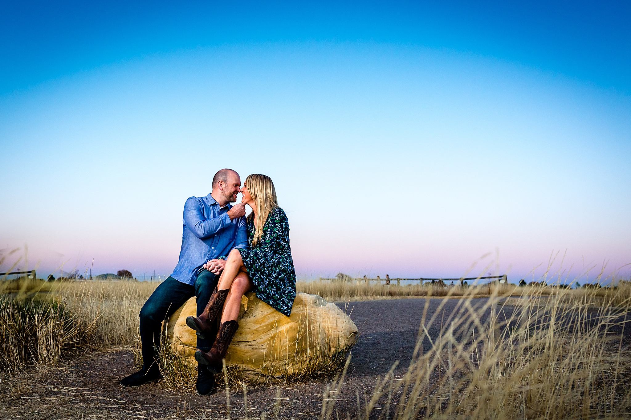 Engaged couple sitting together enjoying the mountain view during their Colorado engagement session. Kelli & Jason’s Sweet Cow Ice Cream and Davidson Mesa Fall Engagement Session by Colorado Engagement Photographer, Jennifer Garza. Colorado Engagement Photographer, Colorado Engagement Photography, Sweet Cow Engagement Session, Davidson Mesa Engagement Session, Colorado Fall Engagement Photos, Fall Engagement Photography, Mountain Engagement Photographer, Colorado Wedding, Colorado Bride, MagMod