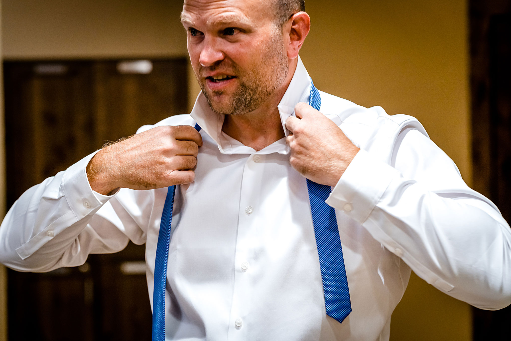 Groom putting his tie on. Kelli & Jason's golf course wedding at The Ranch Country Club by Colorado Wedding Photographer Jennifer Garza, Small wedding ideas, Intimate wedding, Golf Course Wedding, Country Club Wedding, Summer Wedding, Golf Wedding, Wedding planning, Colorado Wedding Photographer, Colorado Elopement Photographer, Colorado Elopement, Colorado Wedding, Denver Wedding Photographer, Denver Wedding, Wedding Inspiration, Summer Wedding Inspiration, Colorado Bride