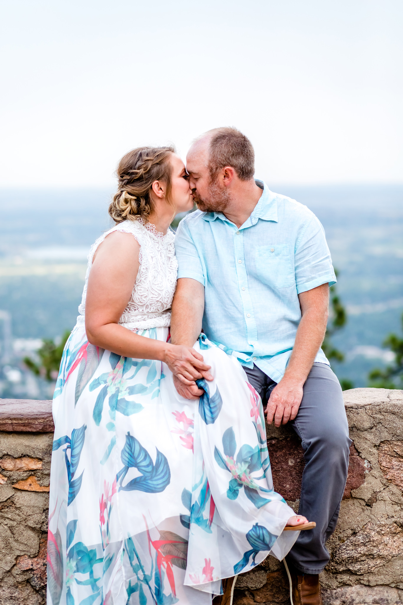 Lauren & Taylor sharing a kiss at Sunrise Amphitheater. Mountain Fall Engagement Session by Colorado Engagement Photographer, Jennifer Garza. Colorado Fall Engagement, Colorado Fall Engagement Photos, Fall Engagement Photography, Fall Engagement Photos, Colorado Engagement Photographer, Colorado Engagement Photography, Mountain Engagement Photographer, Mountain Engagement, Mountain Engagement Photos, Rocky Mountain Bride, Wedding Inspo, Wedding Season, Colorado Wedding, Colorado Bride, Bride to Be, Couples Goals