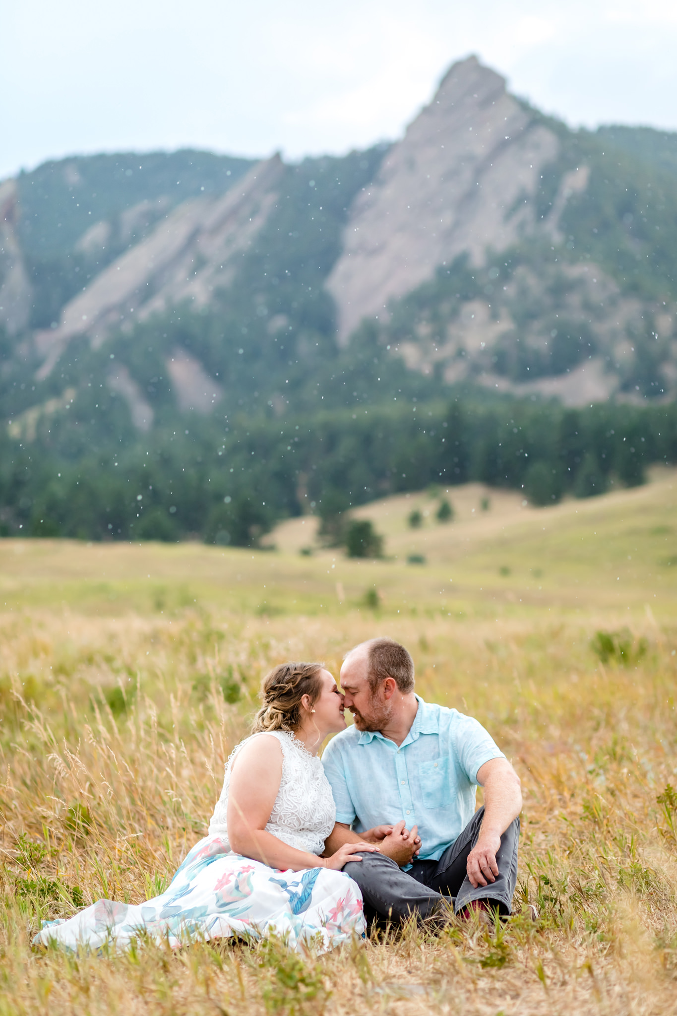 Lauren & Taylor kissing in a field at Chautauqua Park in front of the Colorado Flatirons. Mountain Fall Engagement Session by Colorado Engagement Photographer, Jennifer Garza. Colorado Fall Engagement, Colorado Fall Engagement Photos, Fall Engagement Photography, Fall Engagement Photos, Colorado Engagement Photographer, Colorado Engagement Photography, Mountain Engagement Photographer, Mountain Engagement, Mountain Engagement Photos, Rocky Mountain Bride, Wedding Inspo, Wedding Season, Colorado Wedding, Colorado Bride, Bride to Be, Couples Goals