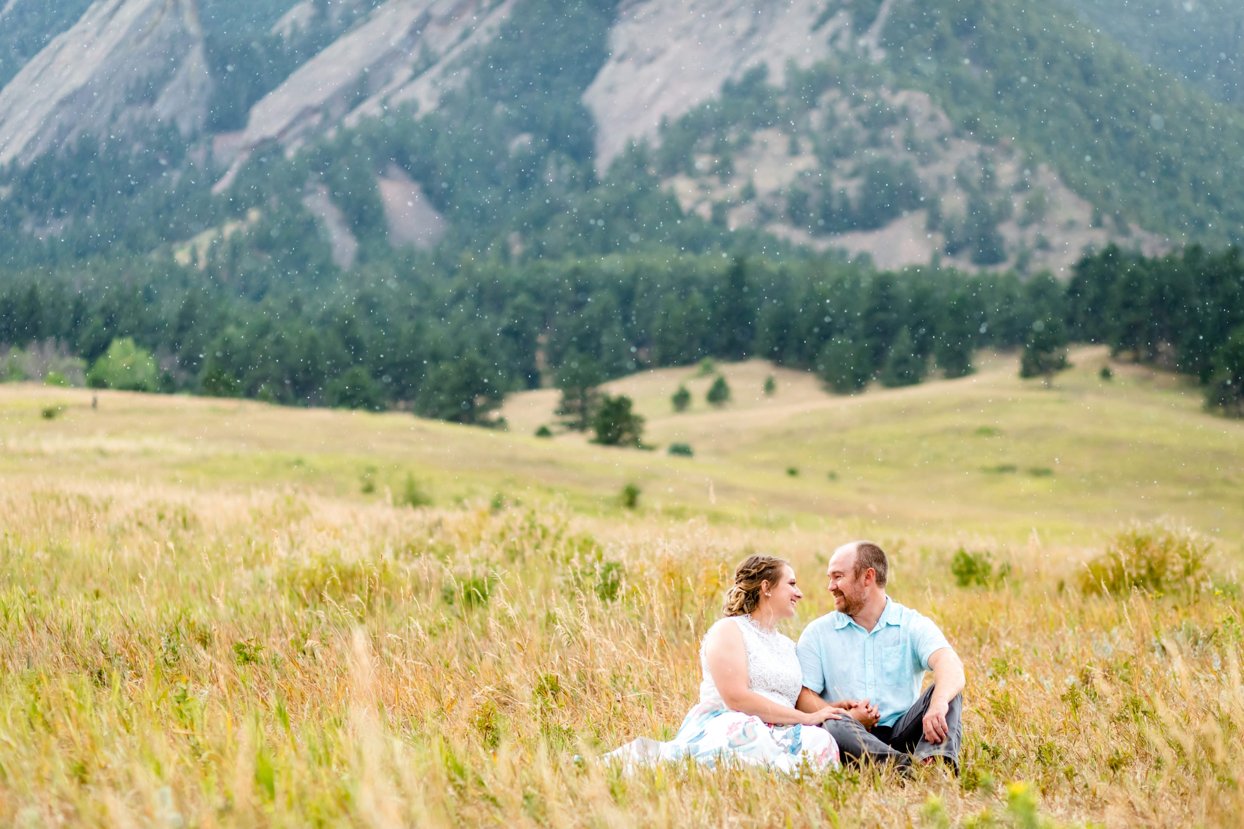 Lauren & Taylor sitting in a field at Chautauqua Park in front of the Colorado Flatirons. Mountain Fall Engagement Session by Colorado Engagement Photographer, Jennifer Garza. Colorado Fall Engagement, Colorado Fall Engagement Photos, Fall Engagement Photography, Fall Engagement Photos, Colorado Engagement Photographer, Colorado Engagement Photography, Mountain Engagement Photographer, Mountain Engagement, Mountain Engagement Photos, Rocky Mountain Bride, Wedding Inspo, Wedding Season, Colorado Wedding, Colorado Bride, Bride to Be, Couples Goals