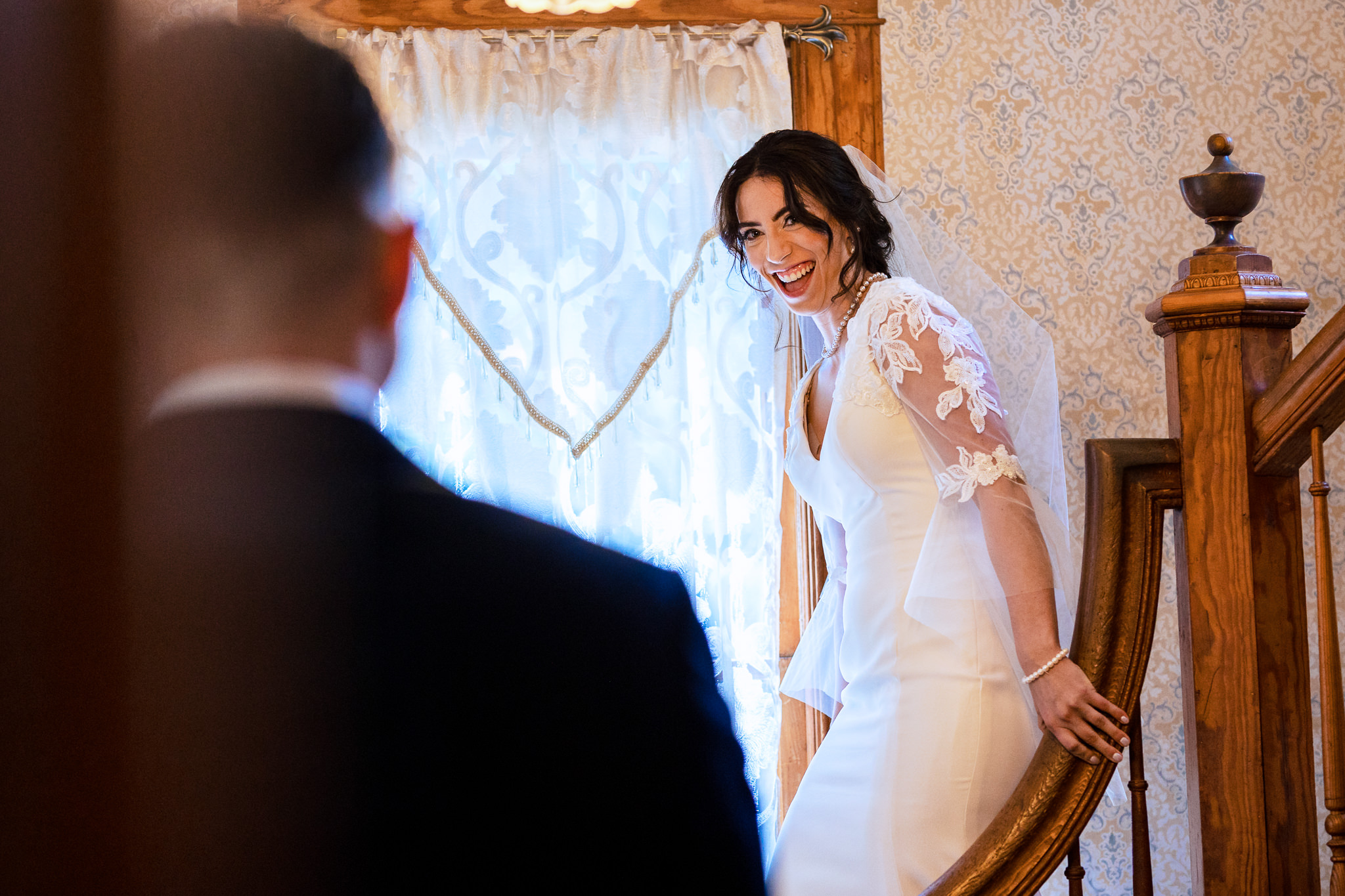 Bride's excited look seeing her Groom during the first look for Haley & Gytenis' Summer Wedding at The McCreery House by Colorado Wedding Photographer, Jennifer Garza.