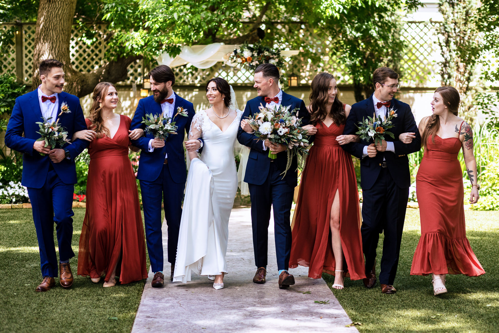 Photo of the entire bridal party out on the lawn for Haley & Gytenis' Summer Wedding at The McCreery House by Colorado Wedding Photographer, Jennifer Garza.