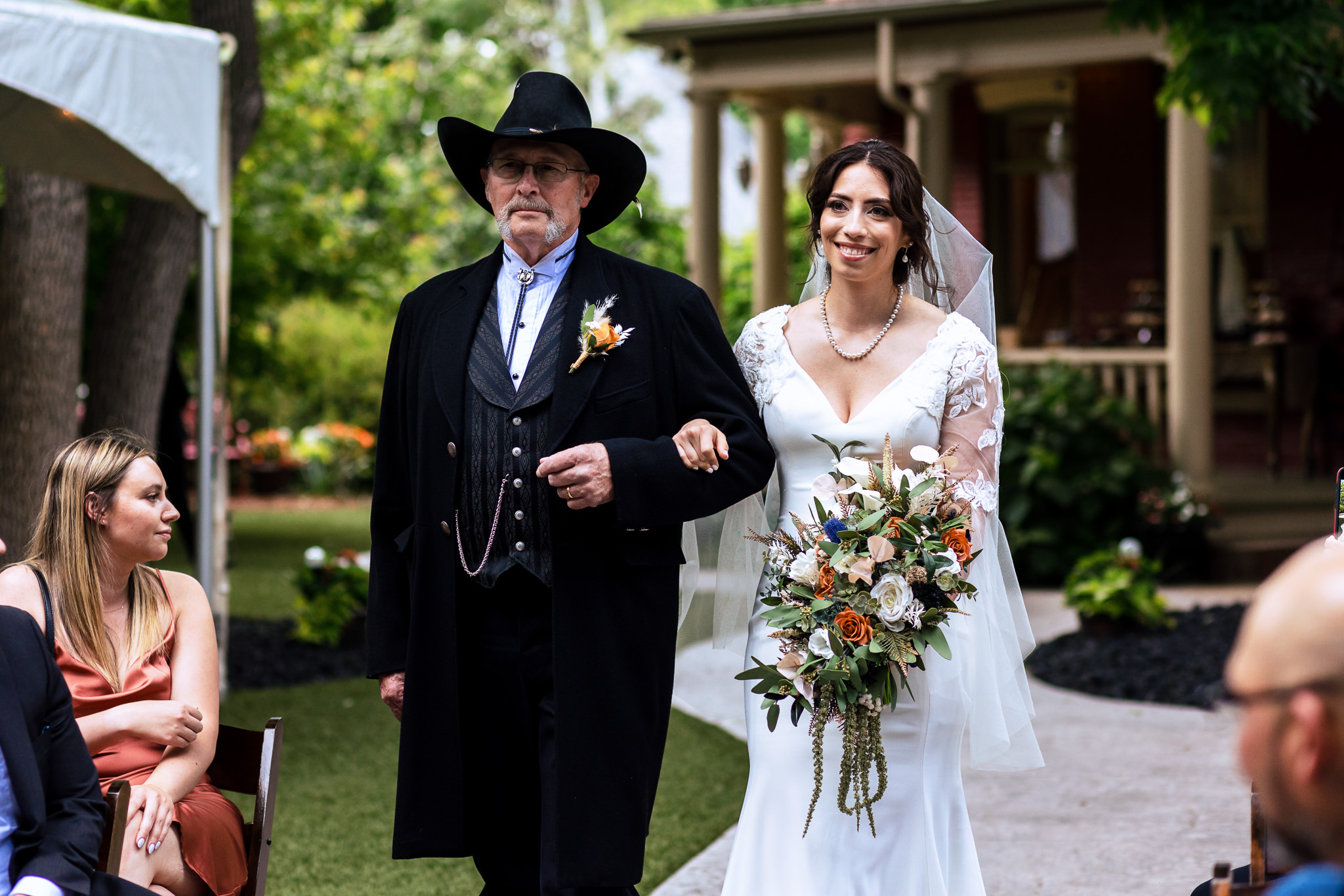 Bride walking down the aisle with her father for Haley & Gytenis' Summer Wedding at The McCreery House by Colorado Wedding Photographer, Jennifer Garza.