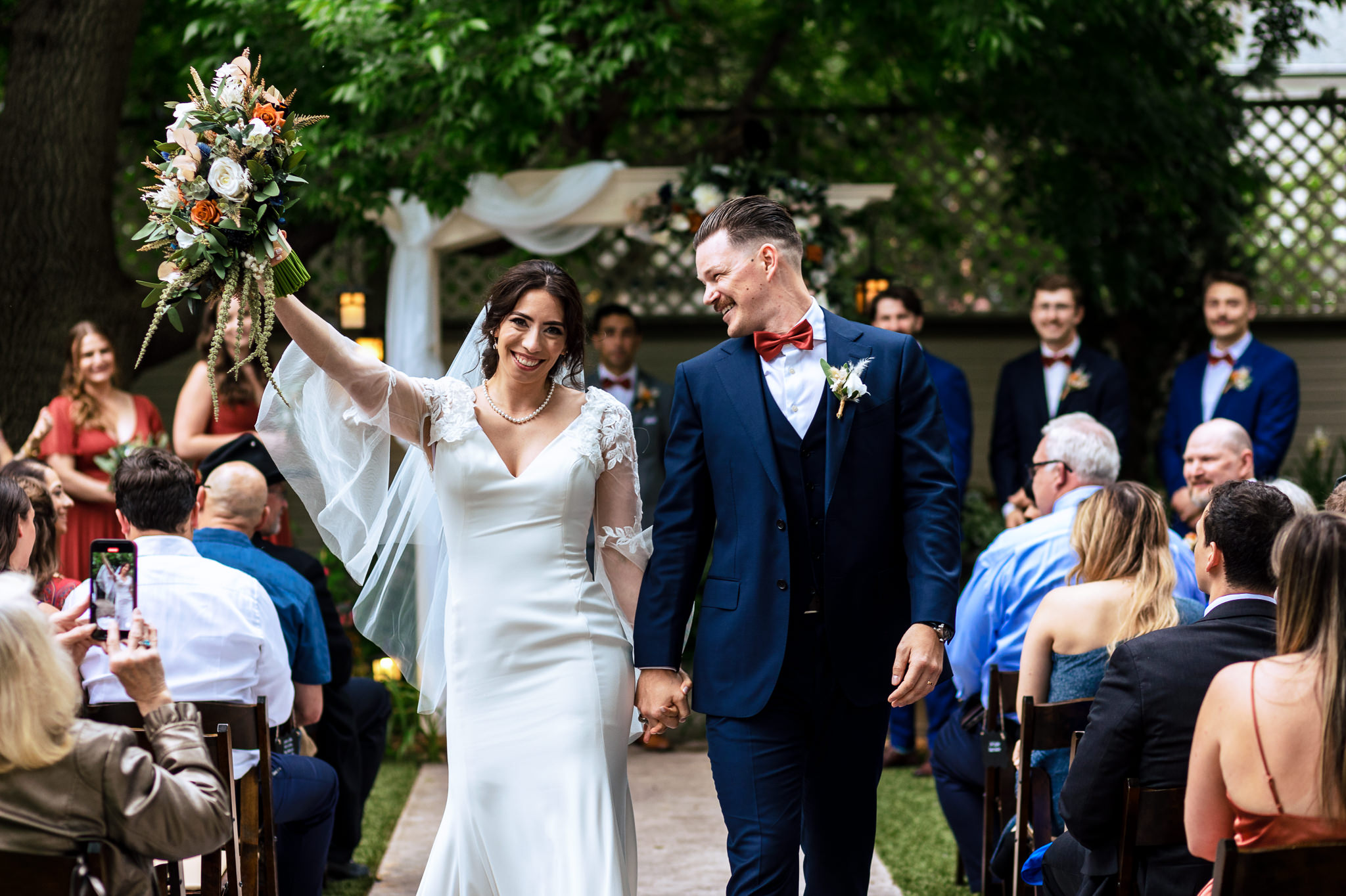 Bride & Groom walking back up the aisle after their wedding ceremony for Haley & Gytenis' Summer Wedding at The McCreery House by Colorado Wedding Photographer, Jennifer Garza.