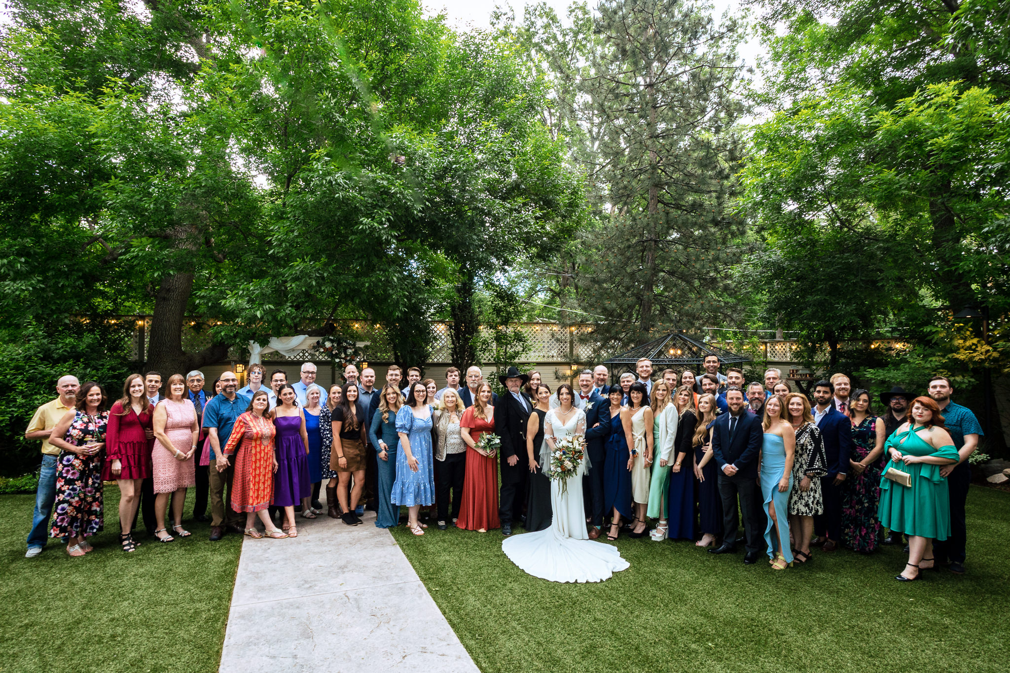 Large group photo of the Bride & Groom with all of their guests for Haley & Gytenis' Summer Wedding at The McCreery House by Colorado Wedding Photographer, Jennifer Garza.